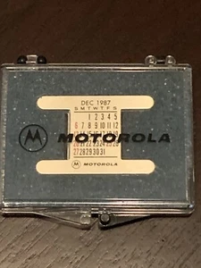 VINTAGE 1987 MOTOROLA WRIST CALENDAR METAL PLATE SET WITH ORIGINAL CASE SHAPER - Picture 1 of 8