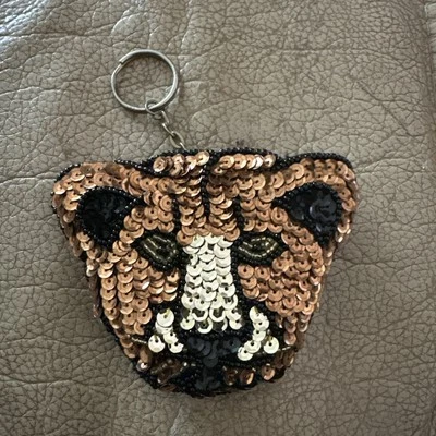 ИЗМЕНИТЬ кошелек «Львица» блестками сумочки ярлык отличном состоянии брелок - Изображение 1 из 4