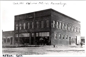 AKRON  COLORADO POST OFFICE & STREET VINTAGE REPRINT REAL PHOTO POSTCARD VIEW - Picture 1 of 2