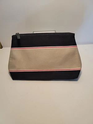 Bolsa de cosméticos Kate Spade a rayas azul marino y crema bolsa con cremallera  Foto 1 de 4