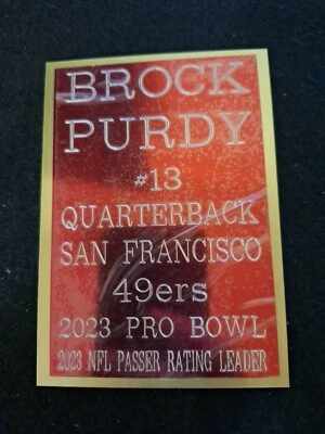 BROCK PURDY 3.2" x 4.75" Engraved Nameplate Red on Gold for a Plaque/Jersey/Ball - Image 1 of 4