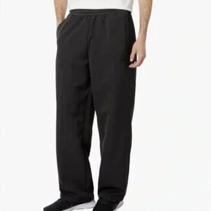 PUMA Pantaloni da Pista Uomo Paisley Luxe Jacquard con Coulisse, Nero, L - Foto 1 di 8