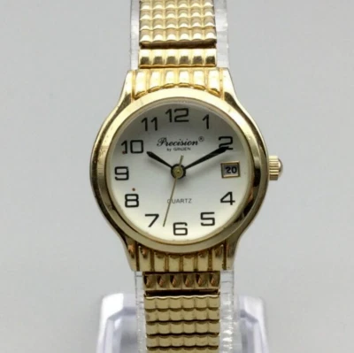 Reloj Precision By Gruen Mujer 25mm Tono Dorado Fecha Banda Elástica Batería Nueva Foto 1 de 4