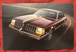 1979 Pontiac Grand Am dealership postcard St. Johns Michigan - Picture 1 of 4