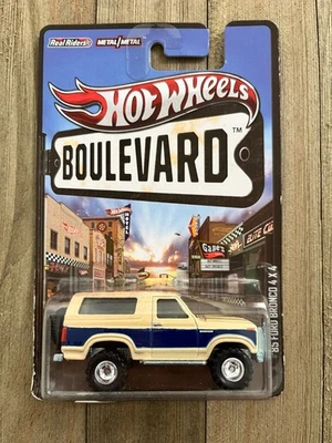 Hot Wheels Boulevard Real Riders металлический '85 Ford Bronco 4x4 бежевый 2013 - Изображение 1 из 4