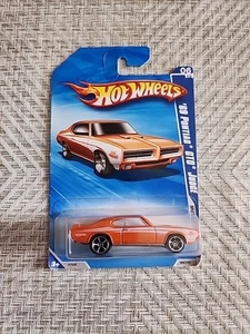 Hot Wheels 2010 Muscle Mania '69 Pontiac GTO Judge arancione 084/240 - Foto 1 di 12