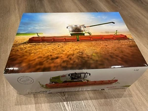 Claas Lexion 780TT mit Mähwerk V1200 und Schneidwerkswagen 1:32 Wiking - Bild 1 von 6