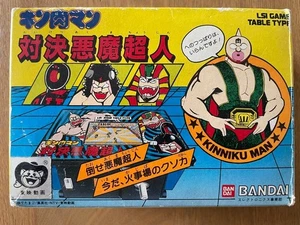 Kinnikuman Demonic Superman Showdown LSI gioco Bandai vintage 1983 usato Jpan - Foto 1 di 14