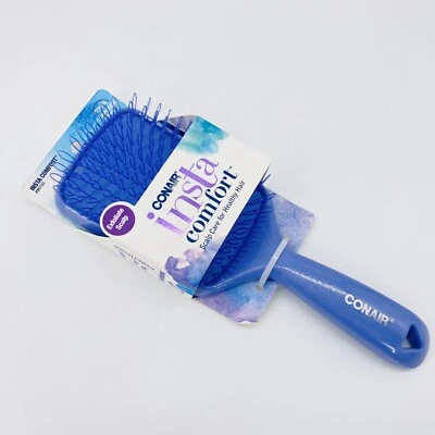 Cepillo de pelo púrpura Conair Insta Comfort exfoliación cuero cabelludo eliminar residuos acumulación Foto 1 de 4