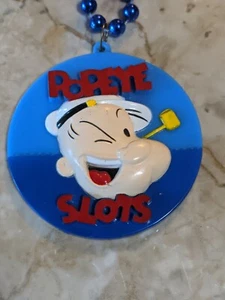 Vintage 80's POPEYE SLOTS Mardi Gras Beads. KFS / TM Hearst Plastic Blue beads. - Picture 1 of 6