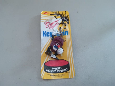 VINTAGE 1987 CALRAB OFFICIAL CALIFORNIA RAISINS FIGURE KEYCHAIN ON CARD AMERCEP Cover