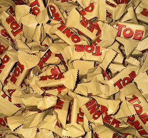 Toblerone Tiny Swiss Milk Chocolate with Honey & Almond Nougat Bars (2 Pounds) - Picture 1 of 11