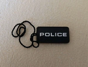 Original Police Uhr / Klamotten / Geldbeutel / Schmuck Anhänger aus Kunststoff - Bild 1 von 7