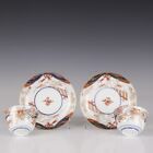 Nice pair of Japanese Imari porcelain cups &amp; saucers, insect in cobweb, ca 1700.
