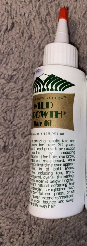 1 WILD GROWTH OLIVE  JOJOBA & COCONUT HAIR OIL DETANGLER & EXTENDER 4 oz - Image 1 of 1