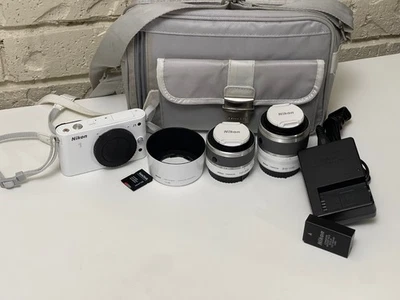 Nikon 1  J1  Digital Camera 10.1 MP  White. w/ 10-30mm and  30-110mm.lenses - Image 1 of 4
