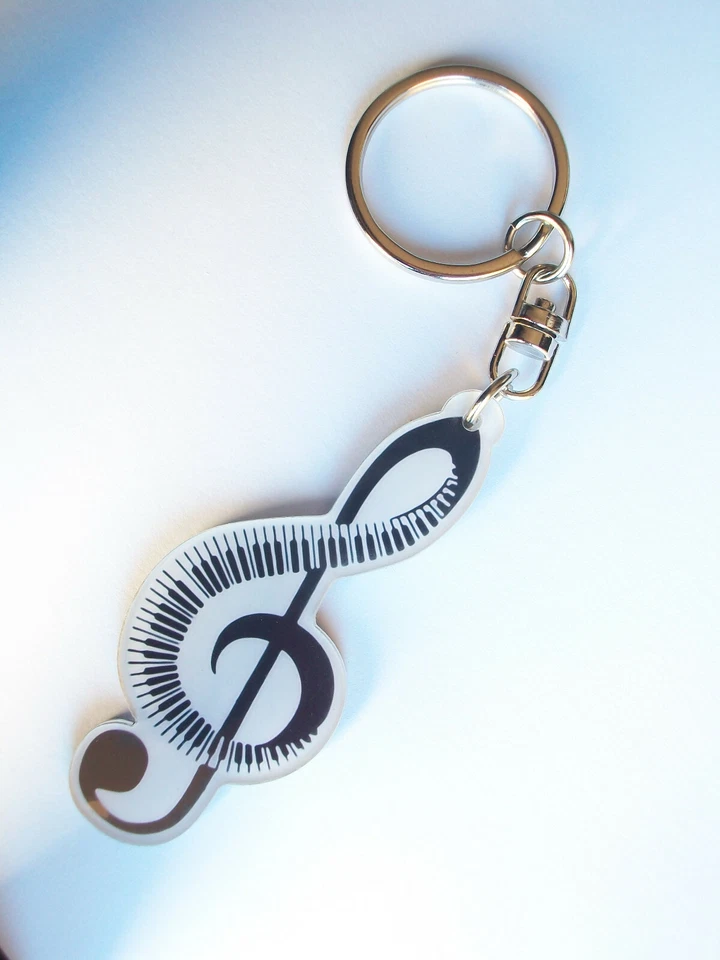 Porte-clé en forme de Clé de Sol faite de touches de piano - Photo 1/1