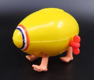 Vintage Yellow Football with Feet Wind Up Toy COO Hong Kong Red White Blue - Picture 1 of 9