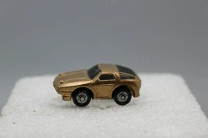 PORSCHE 928 PLÁSTICO ESCALA 1:87 ORO AÑOS 80 DE COLECCIÓN - Imagen 1 de 5