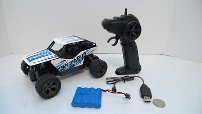 Coche de radiocontrol 4 tréboles con control remoto terreno escala 1:18 2,4 GHz 20 km/H Foto 1 de 4