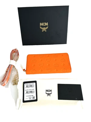 Cartera MCM con cadena logotipo naranja cuero en relieve cremallera alrededor nueva con etiquetas Foto 1 de 4
