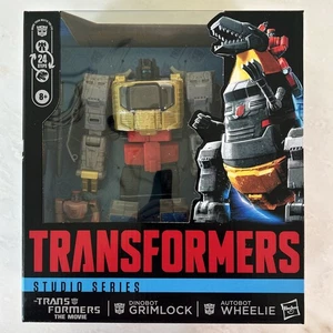 En mano - Figura Hasbro Transformers Studio The Movie Dinobot Grimlock & Wheelie - Imagen 1 de 2