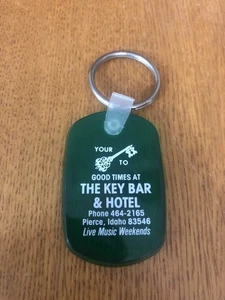 VINTAGE THE KEY BAR & HOTEL PIERCE IDAHO ADVERTISING KEYCHAIN GOOD TIMES - Picture 1 of 2