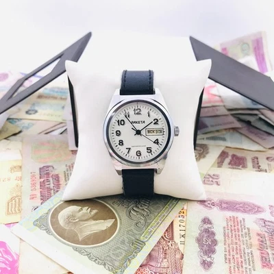 Raketa “Rolex-style” Wrist Watch USSR 2610 Day‑Date White Dial Black Strap 1980s - Image 1 of 4