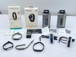 Smartwatch Konvolut Sale Garmin Vivosmart 4 Fitbit - Bild 1 von 20