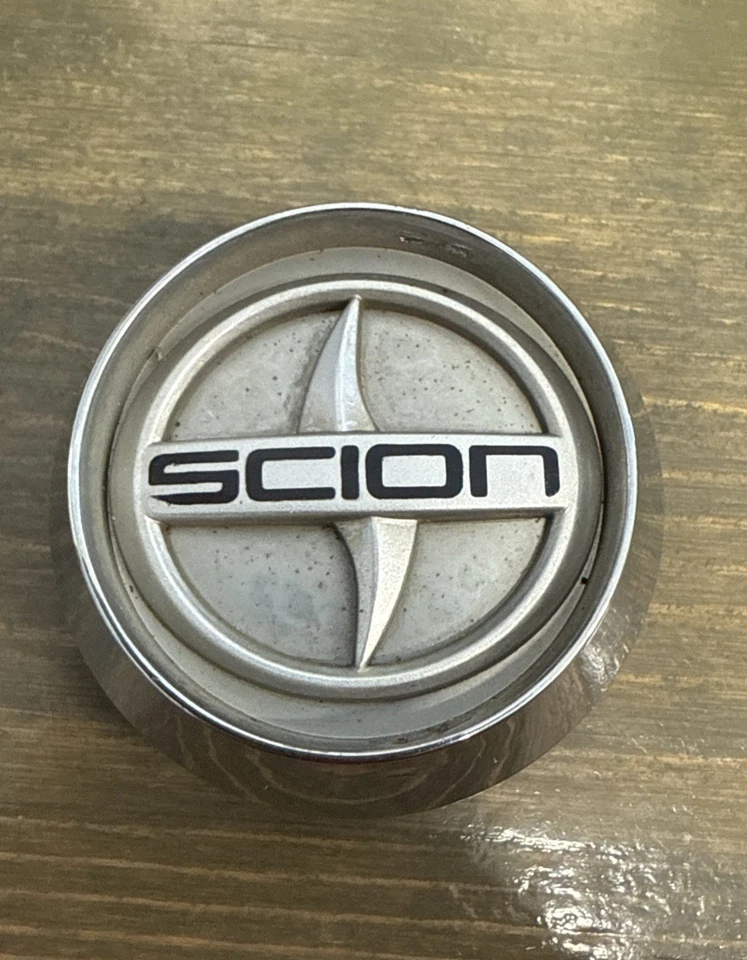 04 05 06 Scion XA OEM Center Hub Cap 69487 capF-109-1 PT904-52040-CC - Image 1 of 4