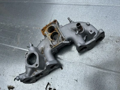 Toyota Celica 20r 1976 colector de admisión 4 cilindros 2 barriles carburador fabricante de equipos originales Foto 1 de 4