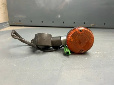 Kawasaki BN125 A7 левый передний индикатор - Изображение 1 из 2