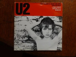 U2, Two hearts beat as one 45 + free single special U.S. mixes-new yrs day - Bild 1 von 2