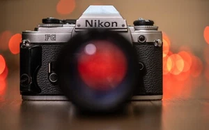 Nikon FG 35mm SLR Camera with 75-150mm Lens - Film Tested and Working! New Seals - Picture 1 of 16