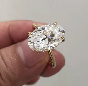 Anello di Fidanzamento Grande 4,5 Ct Moissanite Taglio Ovale Alone Nascosto in Oro Giallo 14k - Foto 1 di 7