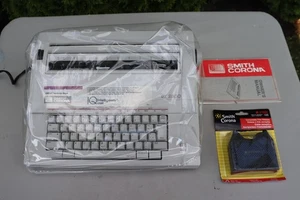 Macchina da scrivere vintage Smith Corona intelligentemente silenziosa DX2600 elettrica portatile TESTATA - Foto 1 di 6