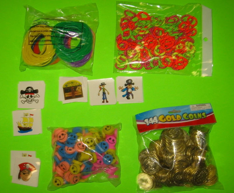 720 JUGUETES 5 PULSERAS DE GELATINA GRUESAS MONEDAS DE ORO PIRATAS TATUAJES FIESTA CARNAVAL PREMIOS Foto 1 de 4