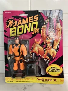 1991 JAMES BOND FLIGHT GEAR 5" ACTION FIGURE #7761 + PARACADUTE FUNZIONANTE REALE - Foto 1 di 2