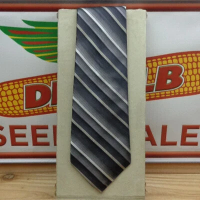 COVINGTON "Tie" Foto 1 de 2