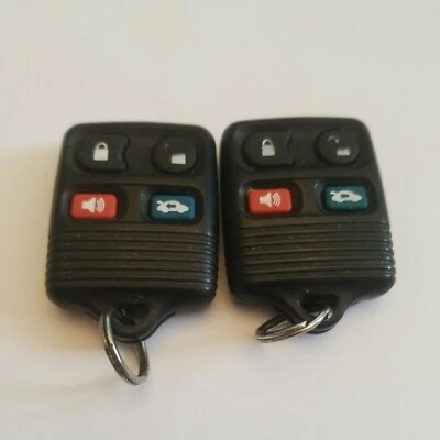 PAR DE 2 CONTROLES REMOTOS SIN LLAVE ORIGINALES OEM FÁBRICA FORD 4 BOTONES CWTWB1U331 GQ43VT11T  Foto 1 de 4