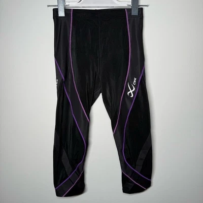 Leggings CW-X negros con ribete morado Foto 1 de 4