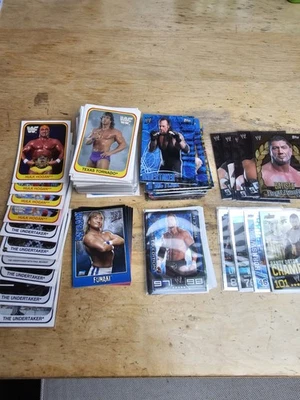 192x WWF / WWE Tradingcards Merlin / Topps, 1991 - 2011, Deutsch  - Bild 1 von 4