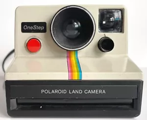 FOTOCAMERA TERRESTRE PELLICOLA ISTANTANEA ORIGINALE VINTAGE ONE STEP POLAROID CON STRISCE ARCOBALENO - Foto 1 di 7
