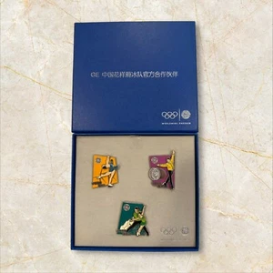 GE Olympics Chinese Figure Skating Team Moving Pins Very Rare - Picture 1 of 6