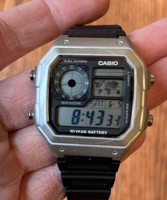 Nuevo Casio AE-1200 Royale en nueva caja de acero inoxidable con banda de resina negra Foto 1 de 4