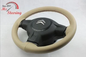 FOR CHRYSLER SEBRING 05-07 BEIGE LEATHER STEERING WHEEL COVER PURPLE STIT - Imagen 1 de 6