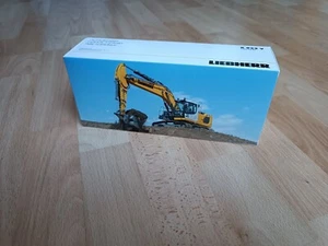 Escavatore idraulico Conrad 2214/0 Liebherr R 922 V Litronic 1:50 NUOVO - Foto 1 di 4