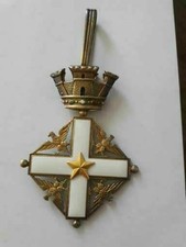 Croce di Commendatore al merito della Repubblica Italiana in argento 800 dorato.