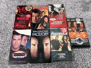 Collection of 7 VHS Con Air Face Off Peacemaker Broken Arrow 007 The Rock LW4 - Picture 1 of 2