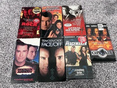 Collection of 7 VHS Con Air Face Off Peacemaker Broken Arrow 007 The Rock LW4 - Imagem 1 de 2